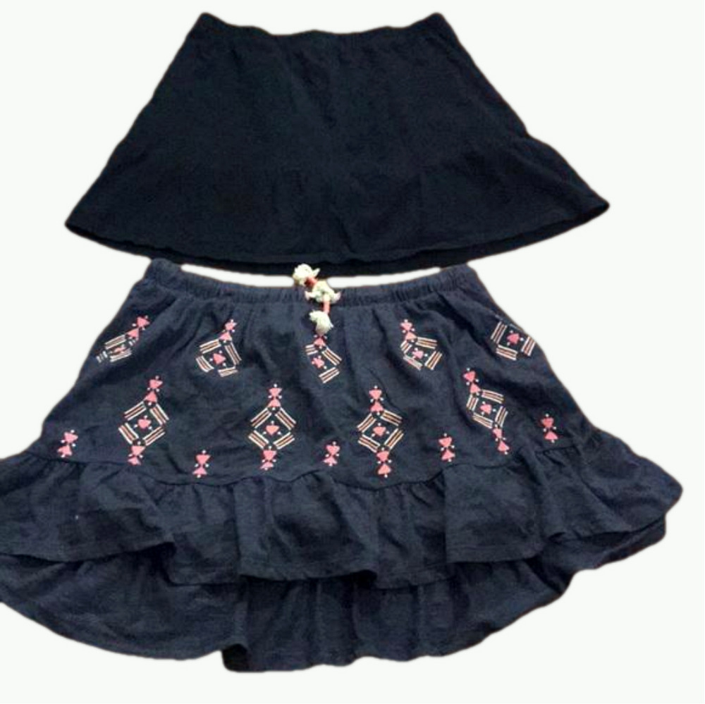 TWO girl’s skirts XL